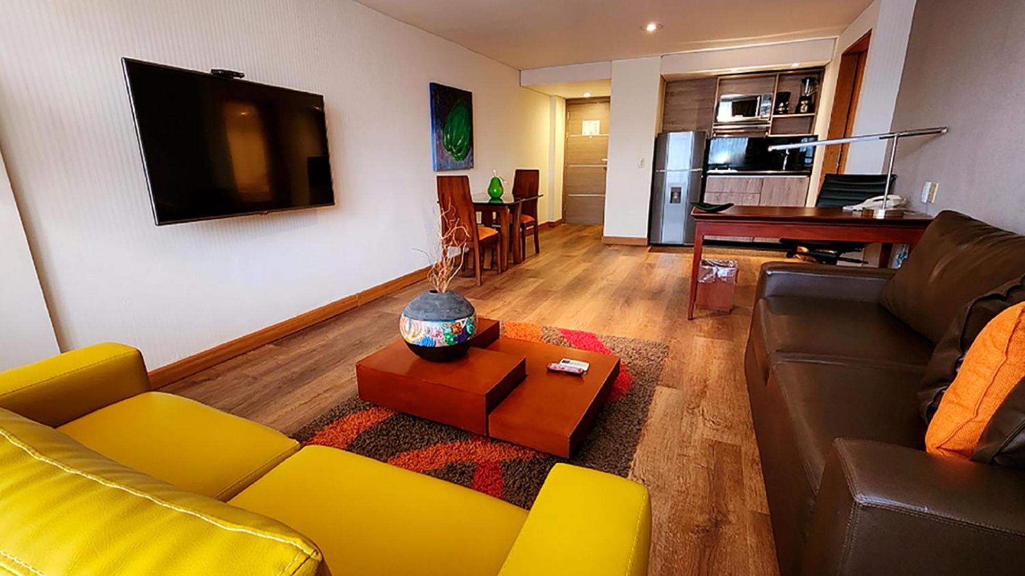 Bogota Plaza Hotel Esterno foto A living room in a serviced apartment in Lima, Peru